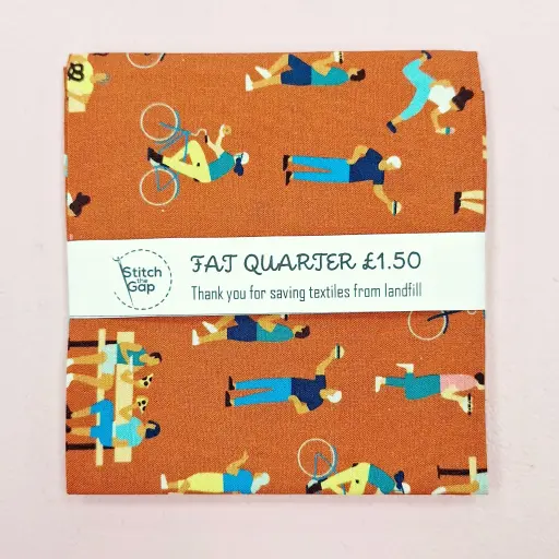 Orange with characters Fat Quarter